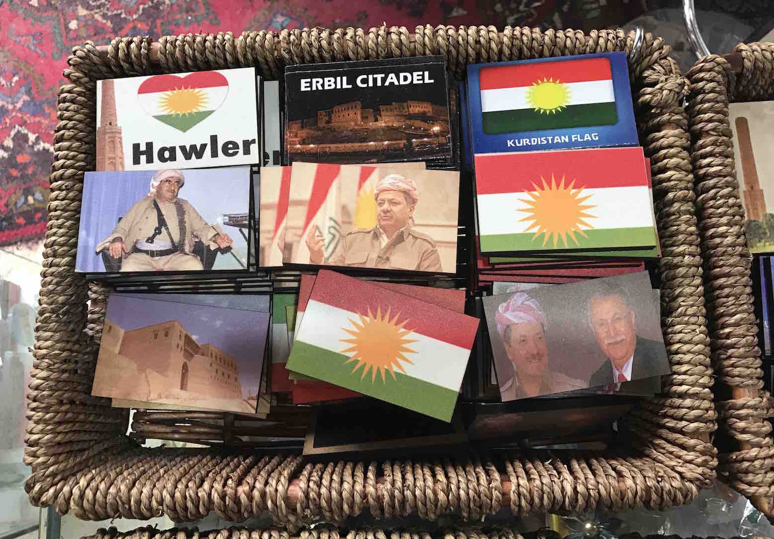 A souvenir shop sells fridge magnets showing the Kurdistan flag and its president Masoud Barzani. A souvenir shop sells fridge magnets showing the Kurdistan flag and its president Masoud Barzani.