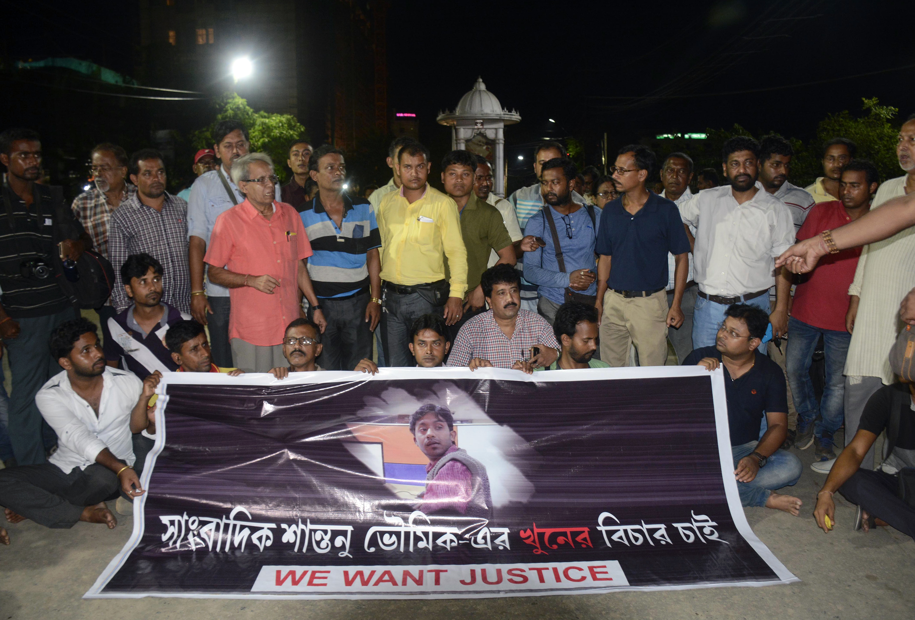 Journalists protest the killing of reporter Santanu Bhowmick in front of the chief minister's residence in Agartala in September. (Credit: Arindam Dey / AFP) Journalists protest the killing of reporter Santanu Bhowmick in front of the chief minister's residence in Agartala in September. (Credit: Arindam Dey / AFP)