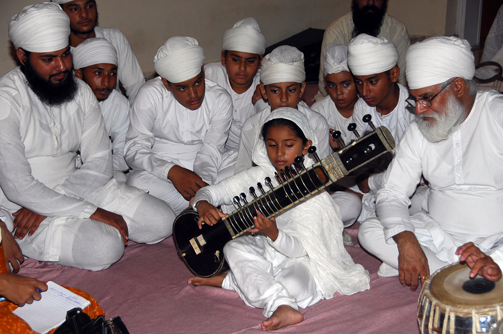 A young girl plays her customised sitar. Image credit: V Dikshit A young girl plays her customised sitar. Image credit: V Dikshit