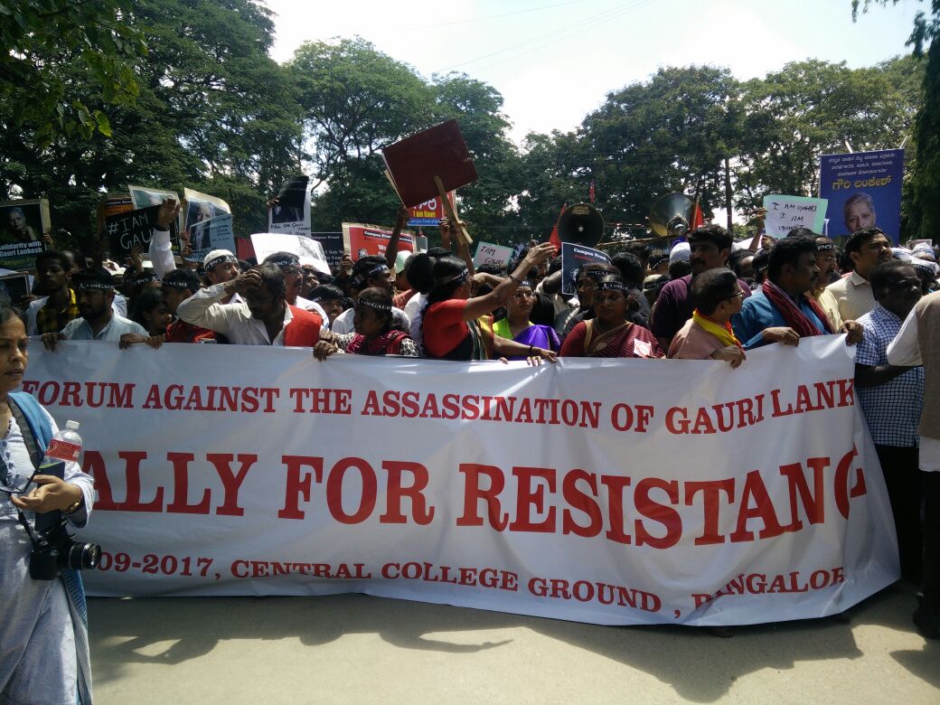 Members of the Forum against the Assassination of Gauri Lankesh hold up a banner. (Credit: Archana Nathan/Scroll.in) Members of the Forum against the Assassination of Gauri Lankesh hold up a banner. (Credit: Archana Nathan/Scroll.in)