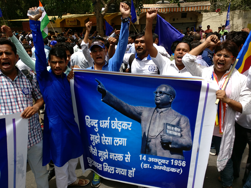 The poster carries a quote by Ambedkar: “After I left Hinduism, it feels like I have left hell” | Photo credit: Shoaib Daniyal The poster carries a quote by Ambedkar: “After I left Hinduism, it feels like I have left hell” | Photo credit: Shoaib Daniyal
