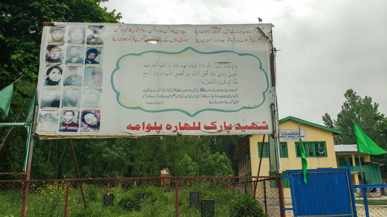 A billboard with the photographs of slain militants in South Kashmir's Pulwama district. A billboard with the photographs of slain militants in South Kashmir's Pulwama district.