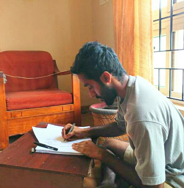 Amateur cartoonist Lakshman at work. Credit: Gautham Balaji Amateur cartoonist Lakshman at work. Credit: Gautham Balaji