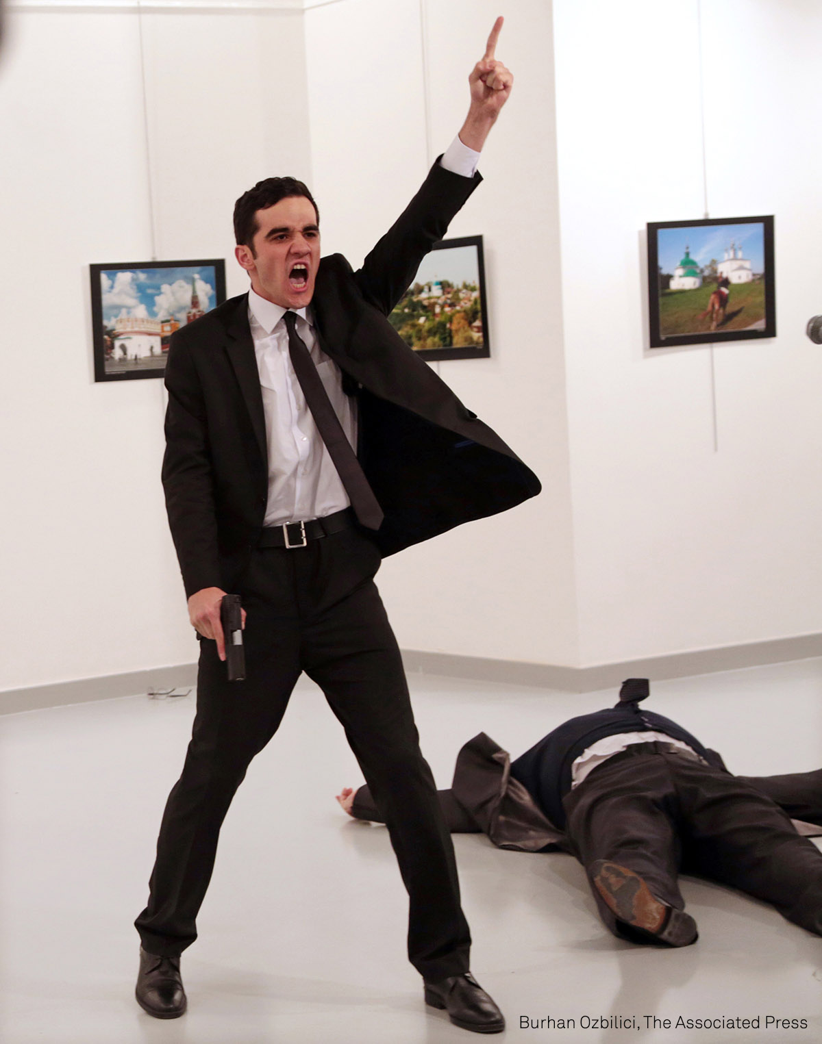 World Press Photo of the Year | An Assassination in Turkey: Mevlut Mert Altintas shouts after shooting Andrei Karlov, the Russian ambassador to Turkey, at an art gallery in Ankara, Turkey, in December 2016. (AP Photo/Burhan Ozbilici). World Press Photo of the Year | An Assassination in Turkey: Mevlut Mert Altintas shouts after shooting Andrei Karlov, the Russian ambassador to Turkey, at an art gallery in Ankara, Turkey, in December 2016. (AP Photo/Burhan Ozbilici).