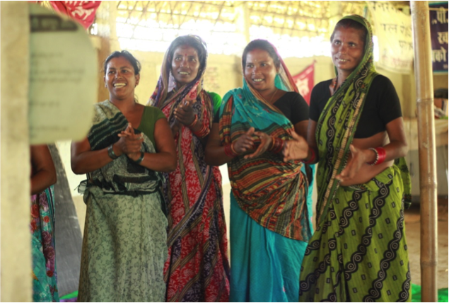 Radha Devi (second from right) is a landless Dalit MNREGA worker who organised workers to demand their entitlements. Radha Devi (second from right) is a landless Dalit MNREGA worker who organised workers to demand their entitlements.
