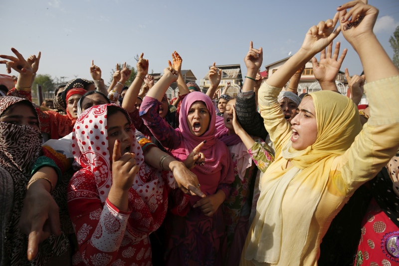 Mourners shout pro-freedom and anti-India slogans during the funeral procession of Junaid Ahmad, 12, in downtown Srinagar last October. The boy was hit by a shower of pellets outside his home. Photo credit: AFP. Mourners shout pro-freedom and anti-India slogans during the funeral procession of Junaid Ahmad, 12, in downtown Srinagar last October. The boy was hit by a shower of pellets outside his home. Photo credit: AFP.