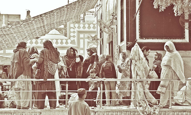 Women at the shrine. Photo by Abdullah Khan. Women at the shrine. Photo by Abdullah Khan.