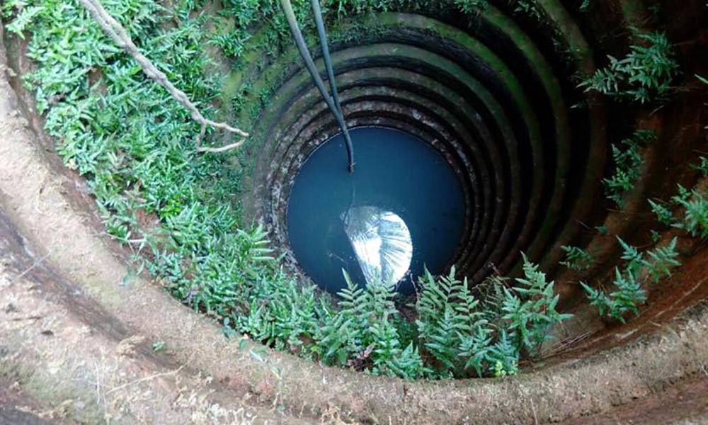 Water discolouration in an open well near the Indian Naval Academy campus at Ezhimala. Water discolouration in an open well near the Indian Naval Academy campus at Ezhimala.