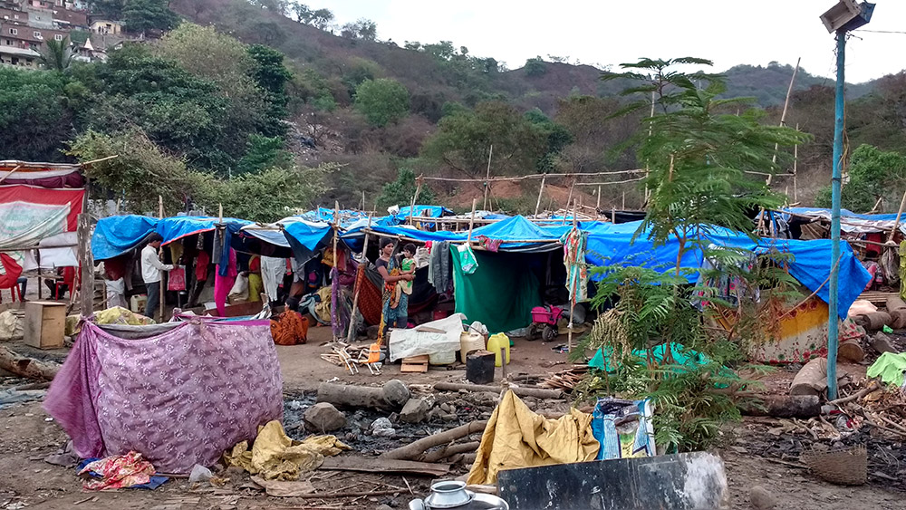 The Ghatkopar camp is set on the slopes of a hillock, which is ordinarily occupied by mounds of garbage, and wild pigs and dogs. (Photo credit: Mridula Chari). The Ghatkopar camp is set on the slopes of a hillock, which is ordinarily occupied by mounds of garbage, and wild pigs and dogs. (Photo credit: Mridula Chari).