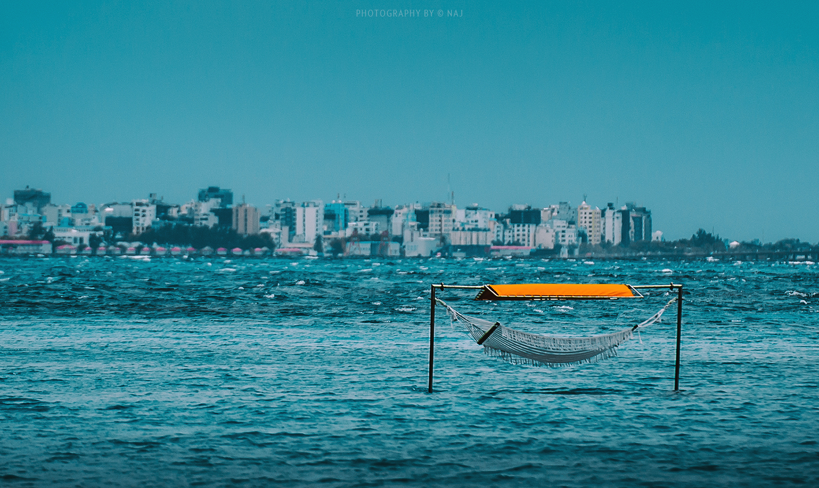 Rising sea levels threaten to sink the low-lying islands by the end of the century. Rising sea levels threaten to sink the low-lying islands by the end of the century.