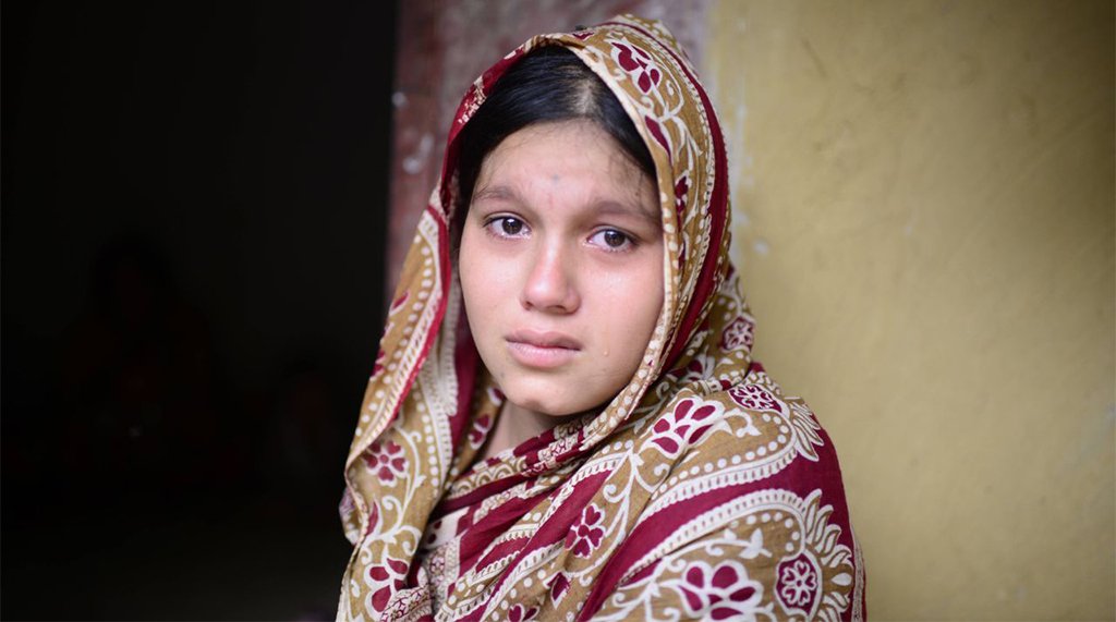 Expectant mother Anika Dhar, 18, escaped to Bangladesh and found shelter at Kutupalong’s Hindu camp with 77 other families. Her husband Milon was shot dead by the Myanmar army on August 27. The photo was taken on September 19, 2017. Photo credit: Mahmud Hossain Opu/Dhaka Tribune Expectant mother Anika Dhar, 18, escaped to Bangladesh and found shelter at Kutupalong’s Hindu camp with 77 other families. Her husband Milon was shot dead by the Myanmar army on August 27. The photo was taken on September 19, 2017. Photo credit: Mahmud Hossain Opu/Dhaka Tribune
