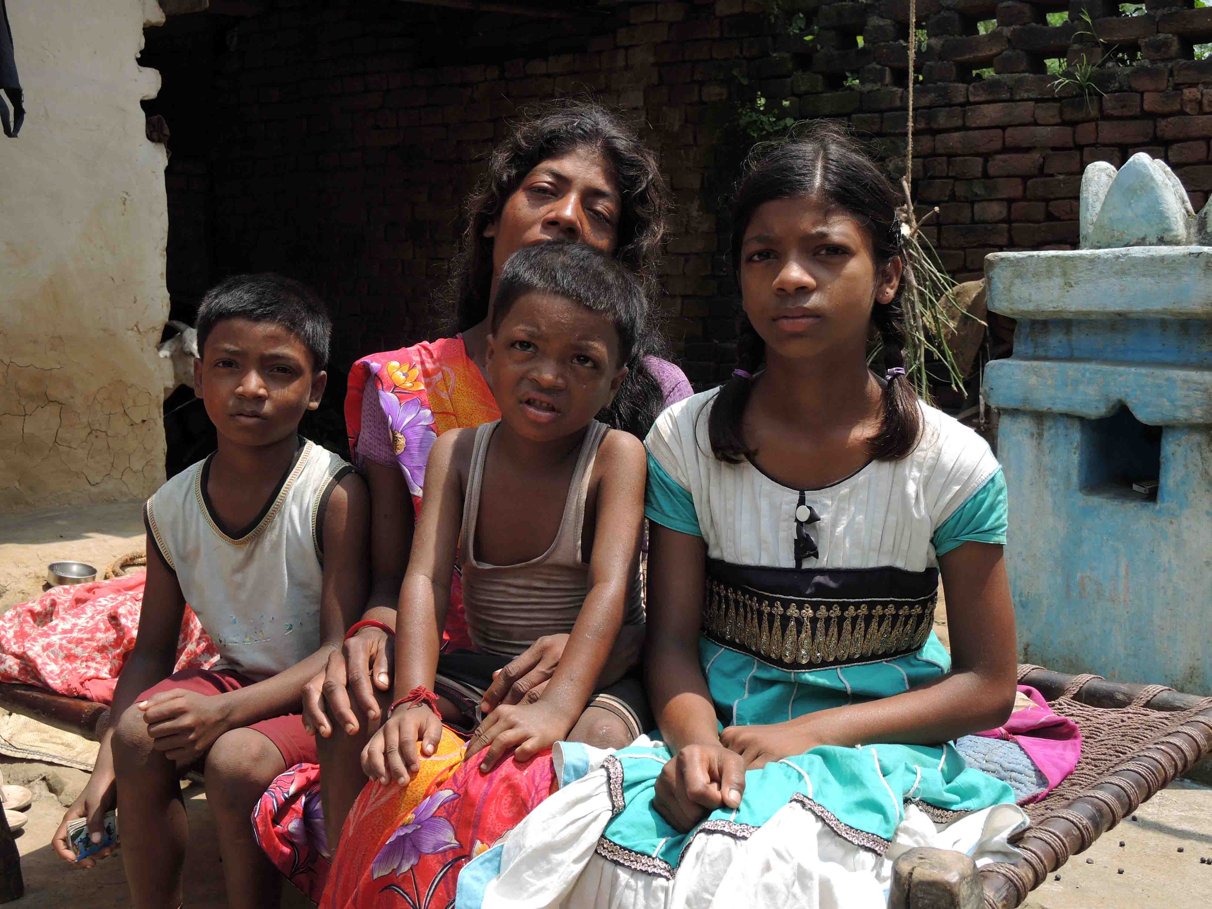 Ram Lakhan Mahto's wife and children, Ritu, Subhash and Anuj at their home. Credit: Manob Chowdhury Ram Lakhan Mahto's wife and children, Ritu, Subhash and Anuj at their home. Credit: Manob Chowdhury