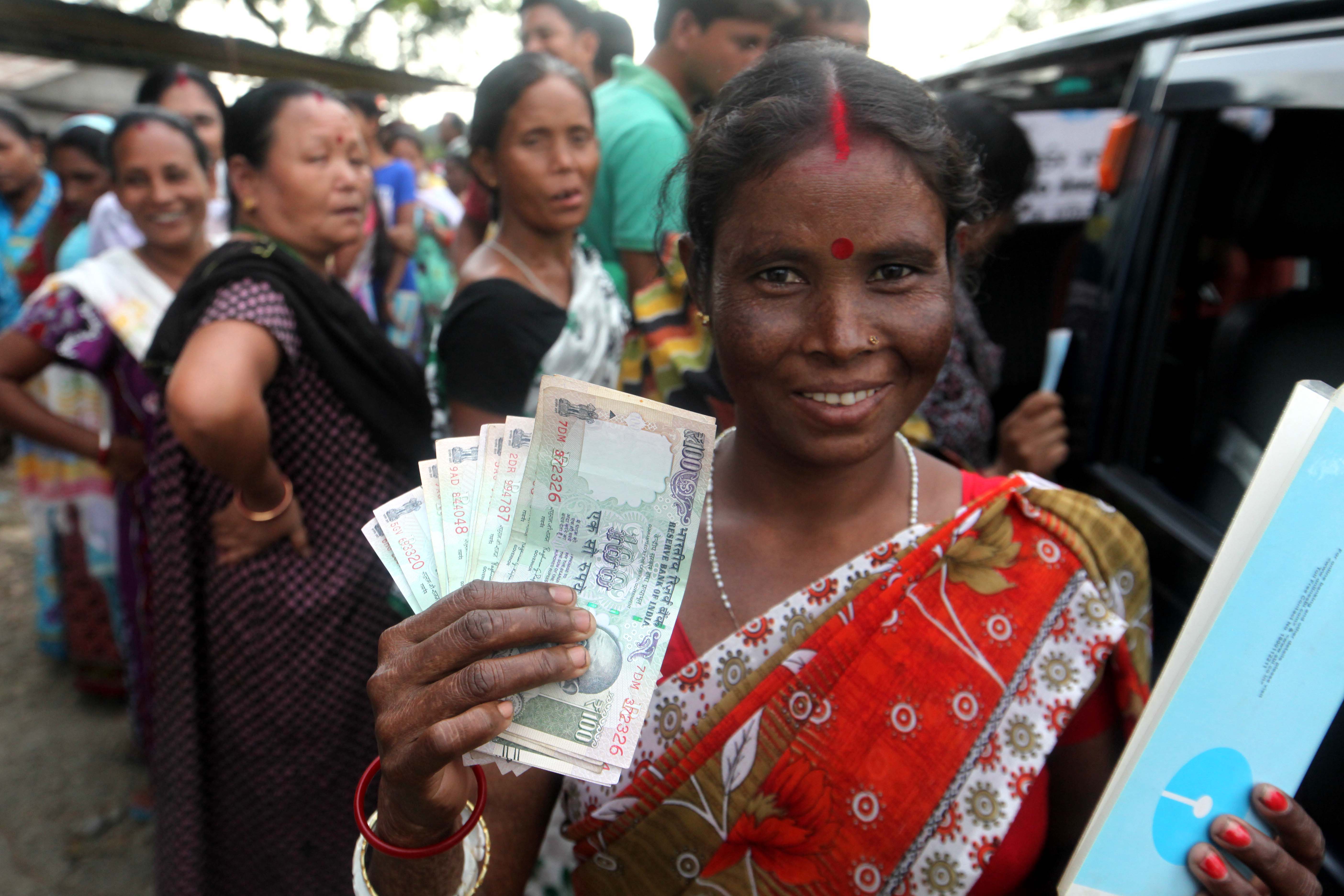 The cash van has brought relief to tea workers after a month of no wages. The cash van has brought relief to tea workers after a month of no wages.