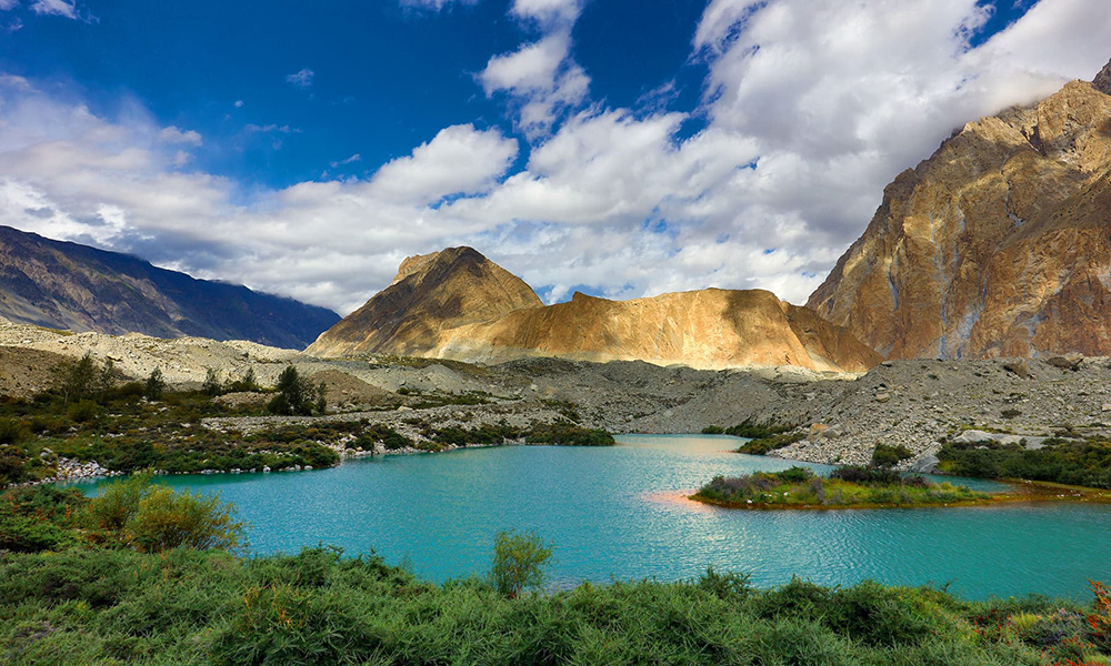 The water of Satpara Lake is a stunning turquoise colour, that left me mesmerised. The water of Satpara Lake is a stunning turquoise colour, that left me mesmerised.