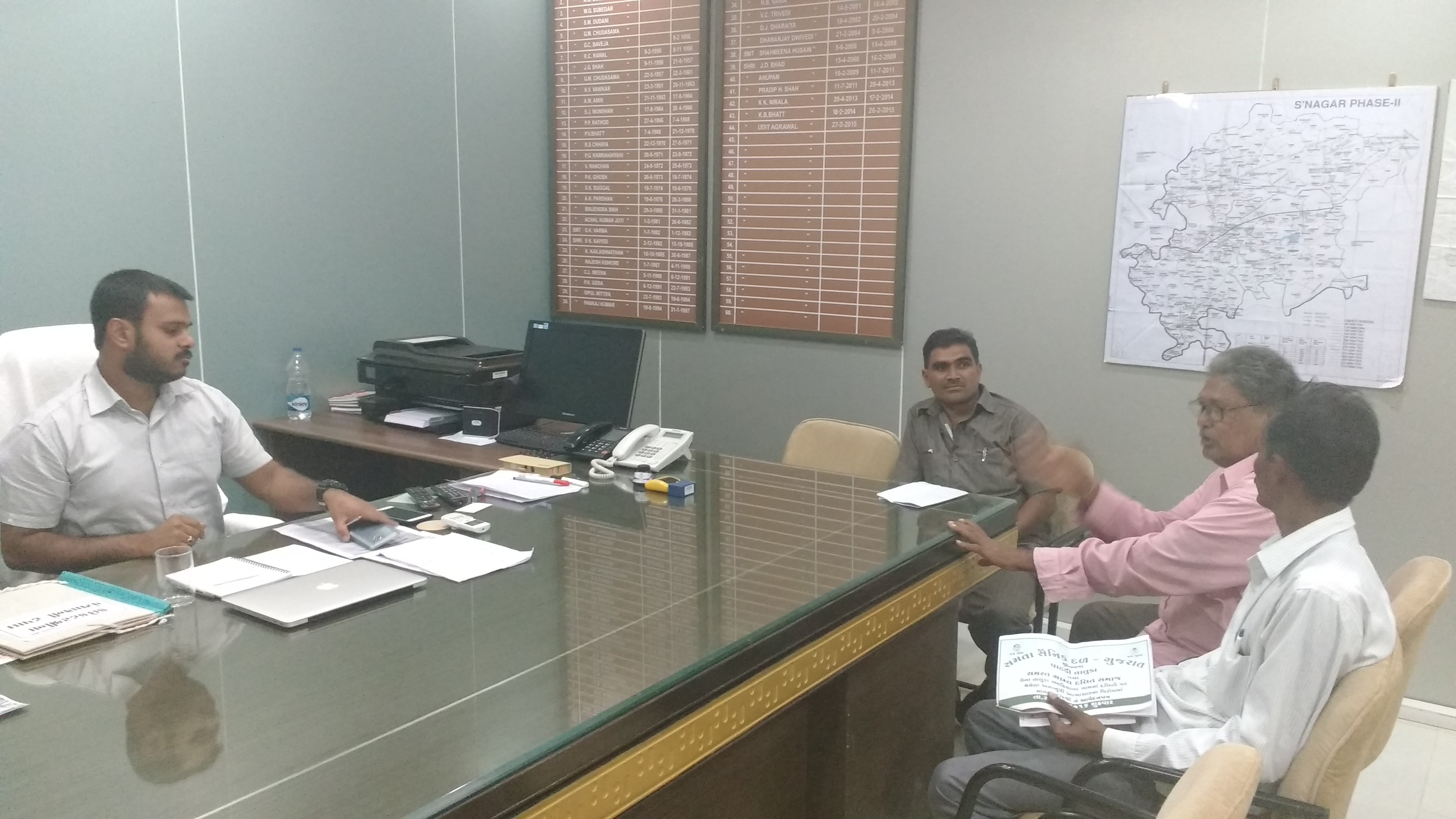 Parmar, Chawda and Rathod meet the Collector. Parmar, Chawda and Rathod meet the Collector.