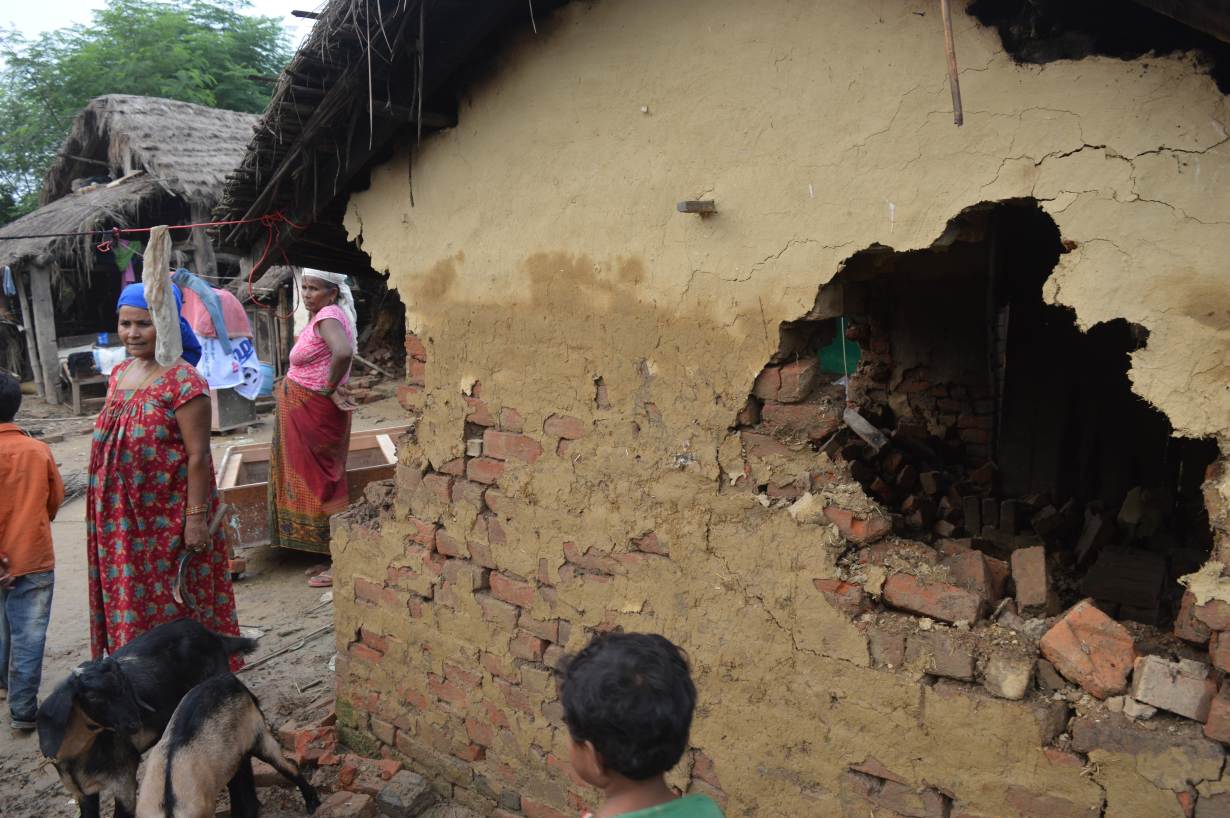 Residents observe flood damage in Taduwa, Nepal, August 16. Photo credit: Arun Karki/Thomson Reuters Foundation Residents observe flood damage in Taduwa, Nepal, August 16. Photo credit: Arun Karki/Thomson Reuters Foundation