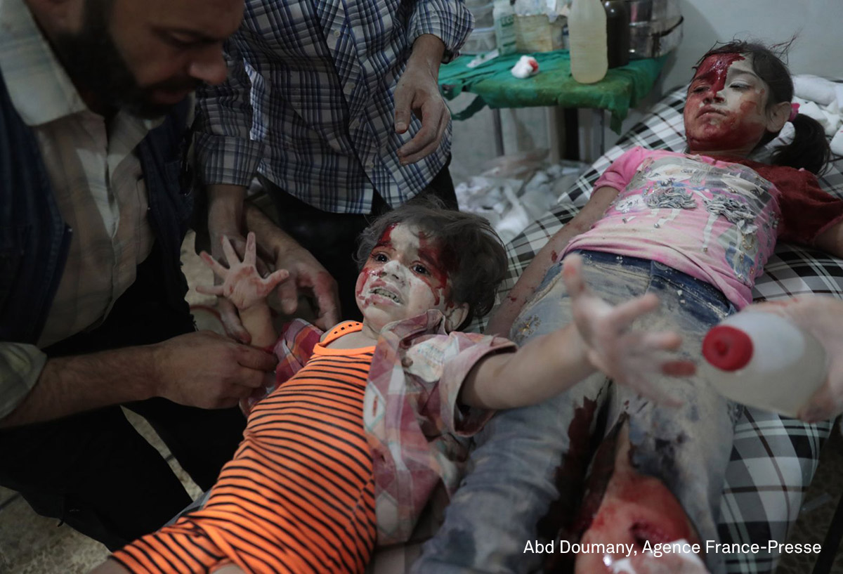 Spot News, second prize (singles) | Medics Assist a Wounded Girl: A Syrian girl cries out as a wounded child lies next to her at a makeshift hospital. She had been injured in reported government airstrikes on the rebel-held town of Douma, east of Damascus, Syria, September 2016. (Abd Doumani for Agence France-Presse) Spot News, second prize (singles) | Medics Assist a Wounded Girl: A Syrian girl cries out as a wounded child lies next to her at a makeshift hospital. She had been injured in reported government airstrikes on the rebel-held town of Douma, east of Damascus, Syria, September 2016. (Abd Doumani for Agence France-Presse)