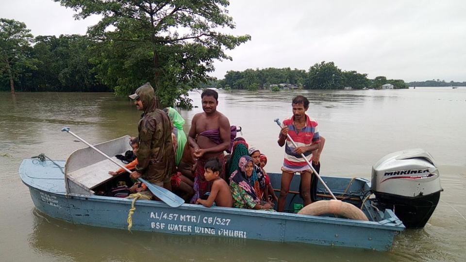 Rescue personnel evacuating villagers in West Bengal's Alipurduar city on Sunday. Bikram Sashanker/HT Photo Rescue personnel evacuating villagers in West Bengal's Alipurduar city on Sunday. Bikram Sashanker/HT Photo