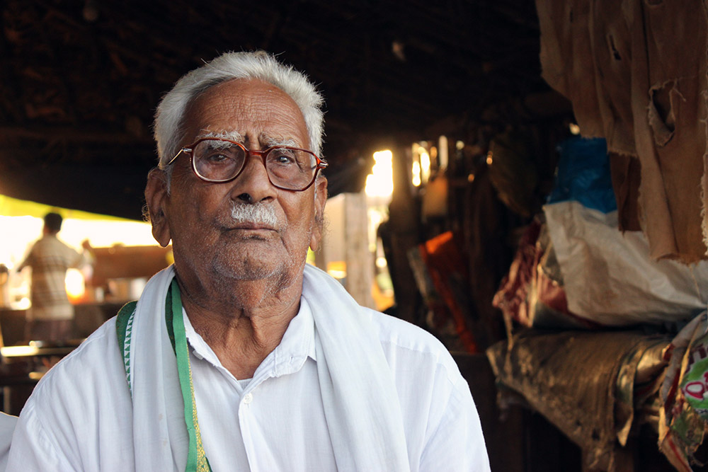 V Sreeselam is a farmer for 60 years. He cultivates five acres of his land and 17 acres of his family land in Lankapalli Village in Krishna, Andhra Pradesh. He needed about 80 bags of fertilisers for his crops this season but the machines do not read his fingerprints for biometric authentication. He has to request the fertiliser seller to adjust his sale on other farmers’ Aadhaar cards everytime. Photo by Kumar Sambhav V Sreeselam is a farmer for 60 years. He cultivates five acres of his land and 17 acres of his family land in Lankapalli Village in Krishna, Andhra Pradesh. He needed about 80 bags of fertilisers for his crops this season but the machines do not read his fingerprints for biometric authentication. He has to request the fertiliser seller to adjust his sale on other farmers’ Aadhaar cards everytime. Photo by Kumar Sambhav