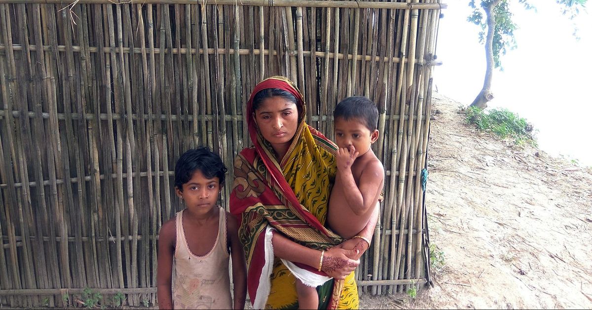 Yakub Ali's wife and children. Yakub Ali's wife and children.