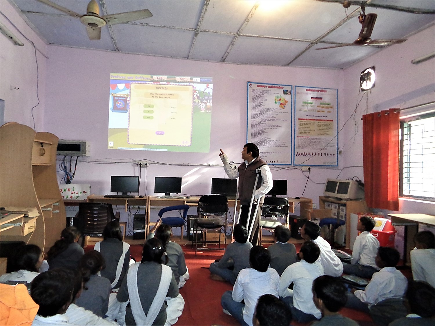Negi using the school's projector during a class. (Photo credit: Pradeep Negi). Negi using the school's projector during a class. (Photo credit: Pradeep Negi).