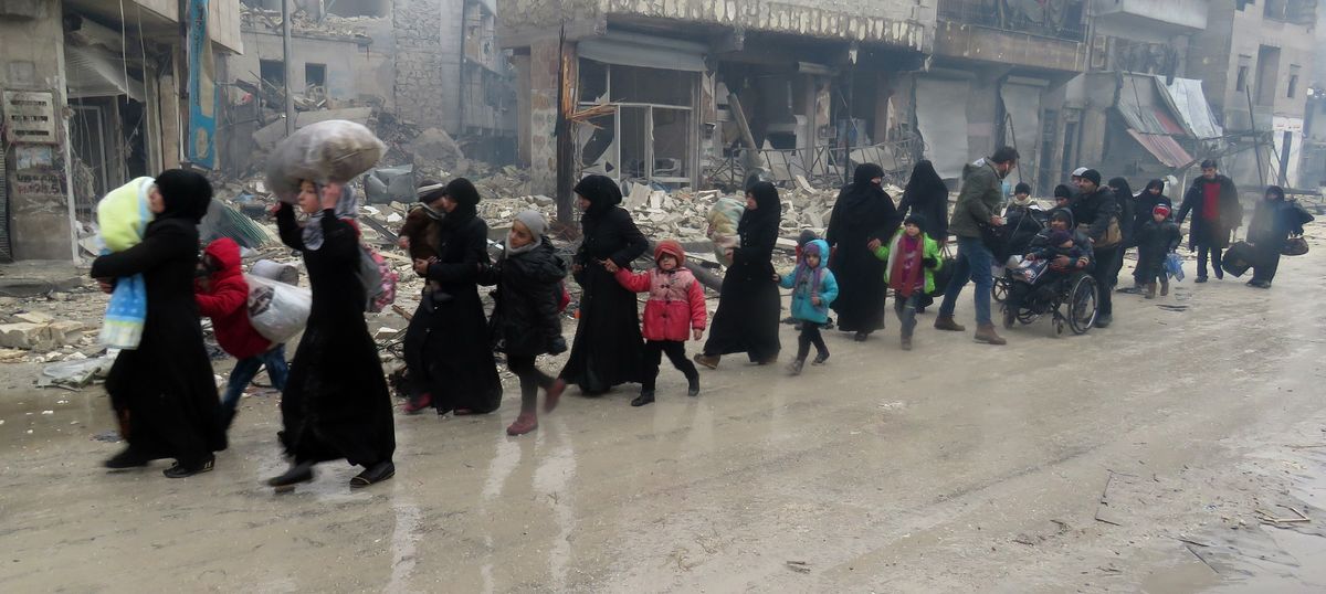 Gunfire erupts in Aleppo before the evacuation of civilians can begin