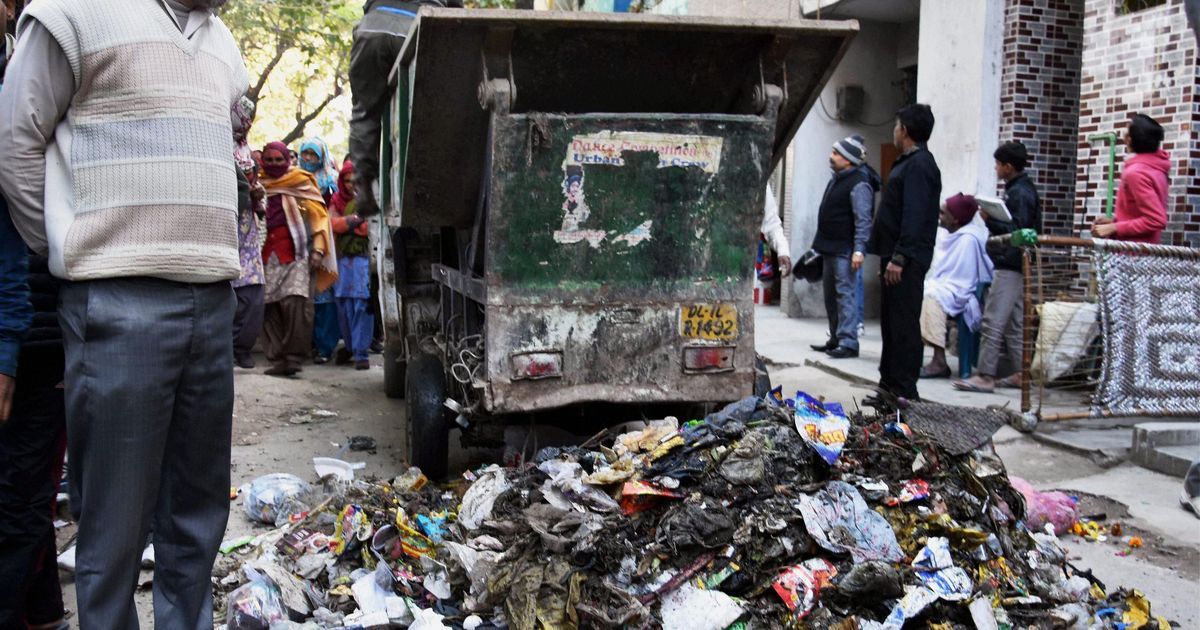 Garbage piles up in Delhi as more sanitation workers join protest against unpaid salaries