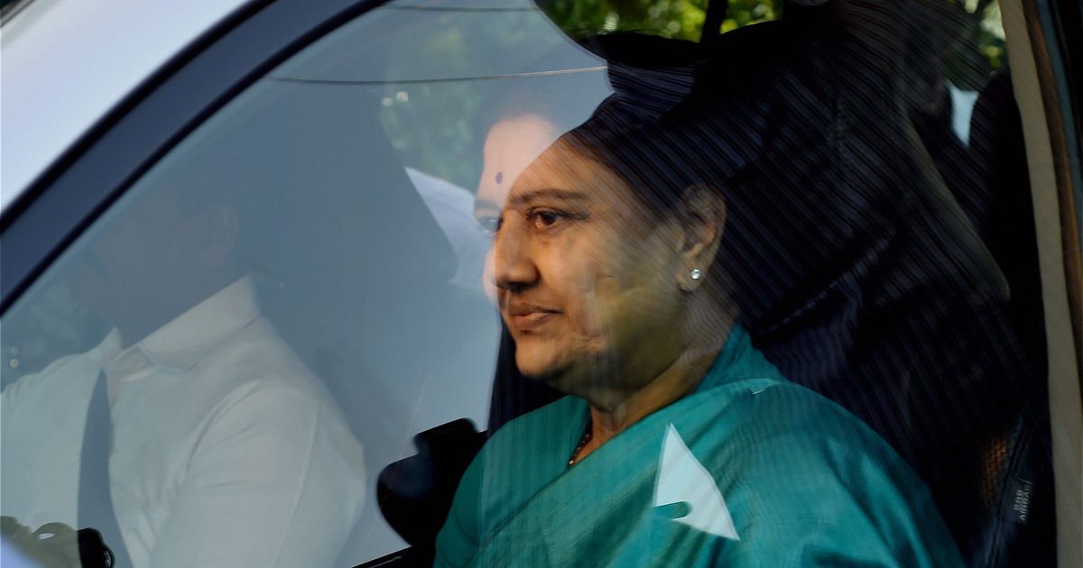 VK Sasikala returns to poll-bound Tamil Nadu in vehicle carrying AIADMK flag