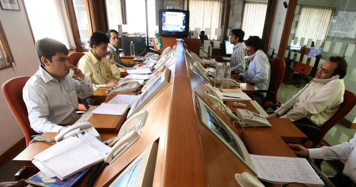Markets trade flat as investors book profits