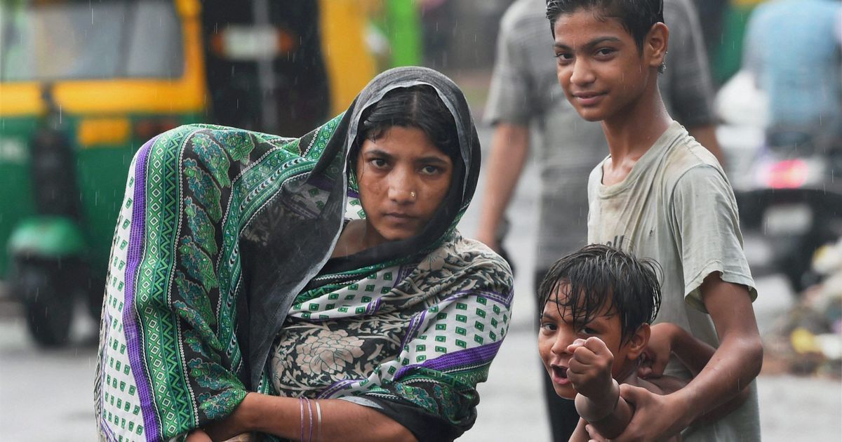 In photos: How Indians plodded along on a stormy Monday