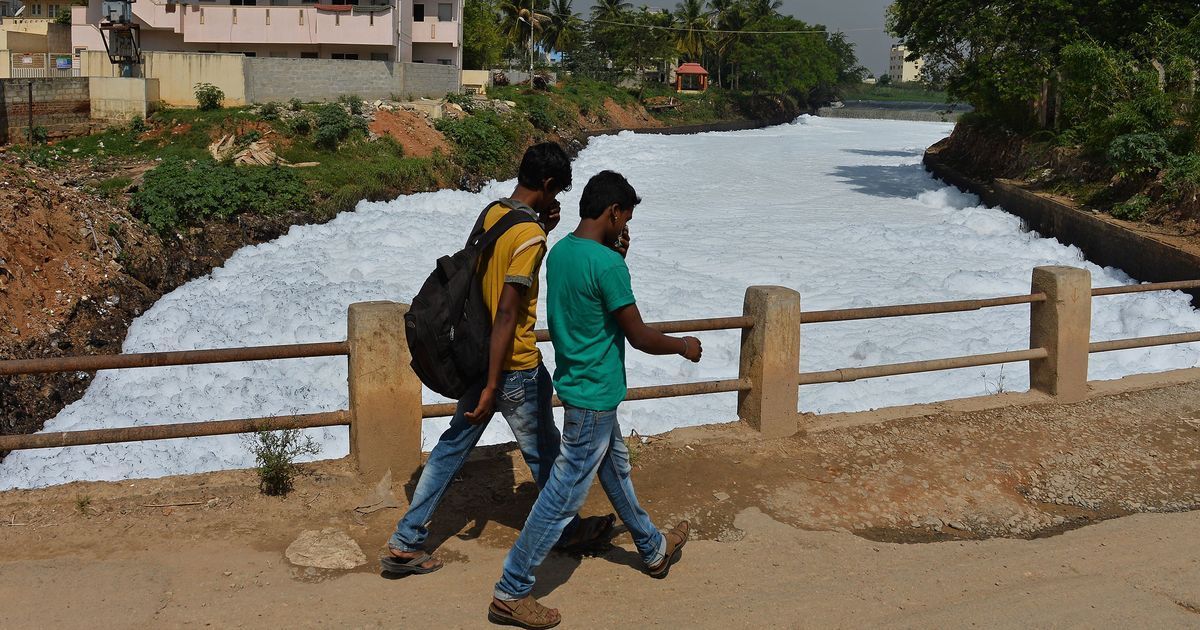 Cars disappear into foam as froth engulfs Bengaluru road Cars disappear into foam as froth engulfs Bengaluru road