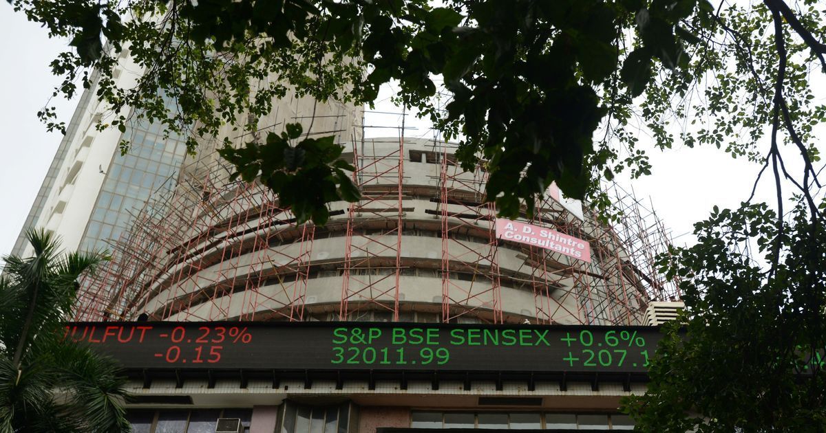 Sensex, Nifty overcome early losses to close marginally higher