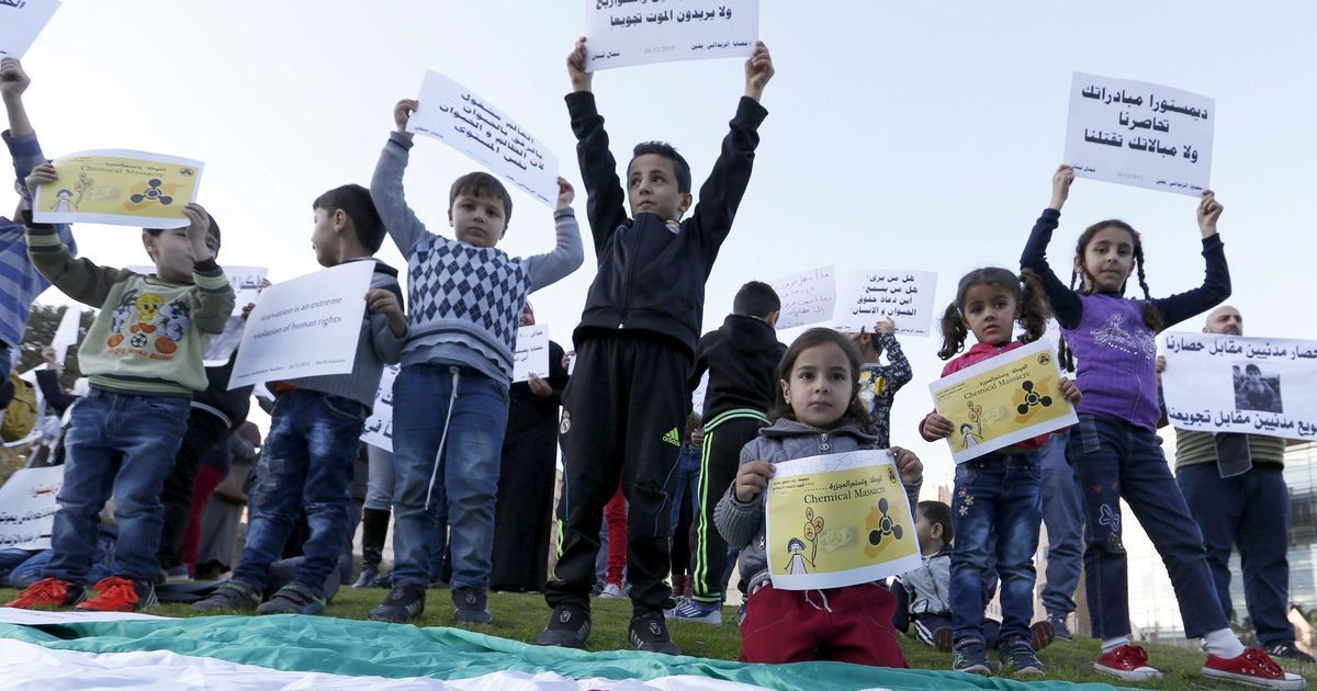 Syria: At least 58 killed in chemical attack on rebel-held town, says rights monitor