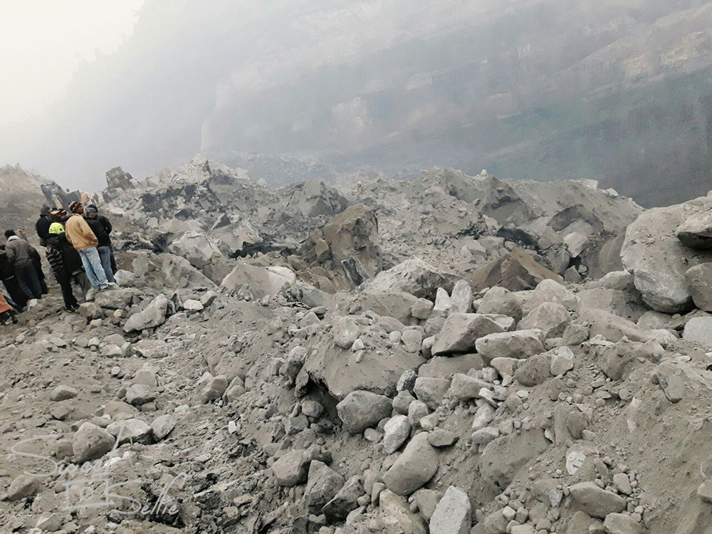 More than 20 workers were trapped under 200 feet of debris when the debris removed at the open-cast mine collapsed on Thursday evening. Image Credit: Manob Chowdhury More than 20 workers were trapped under 200 feet of debris when the debris removed at the open-cast mine collapsed on Thursday evening. Image Credit: Manob Chowdhury