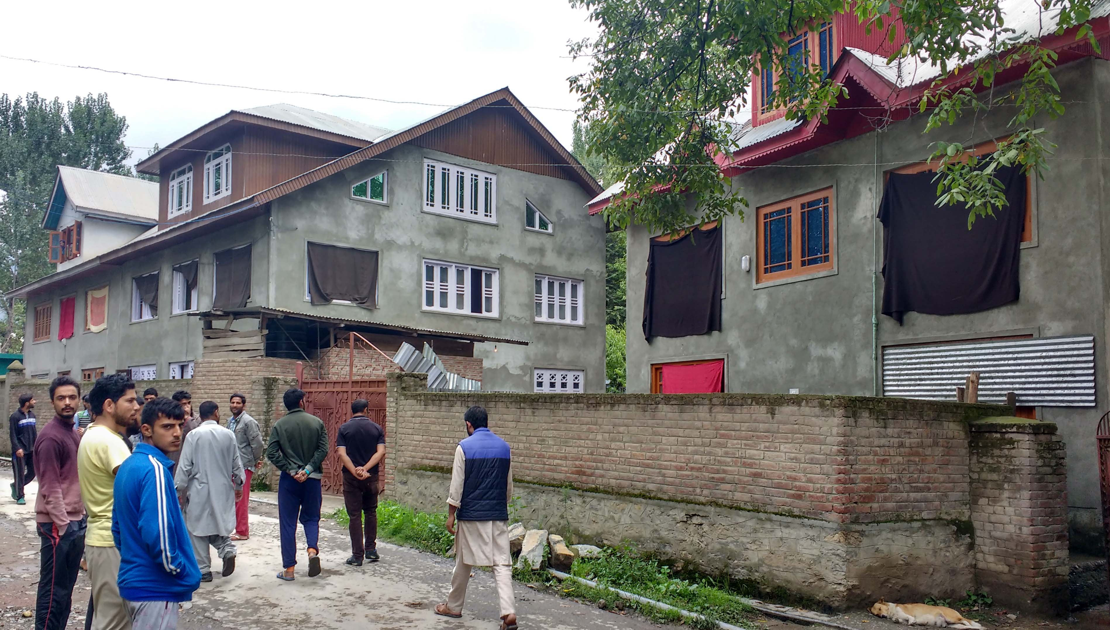 Residents of Mangoo Mala mohalla have covered their broken windows with sheets of cloth or tin. Photo credit: Rayan Naqash. Residents of Mangoo Mala mohalla have covered their broken windows with sheets of cloth or tin. Photo credit: Rayan Naqash.