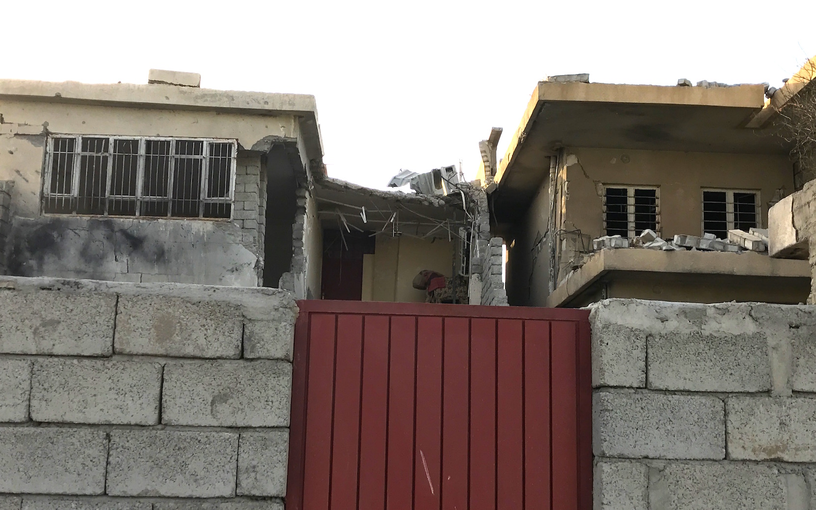 Khalil's damaged house in Al-Habda neighbourhood in east Mosul. Khalil's damaged house in Al-Habda neighbourhood in east Mosul.