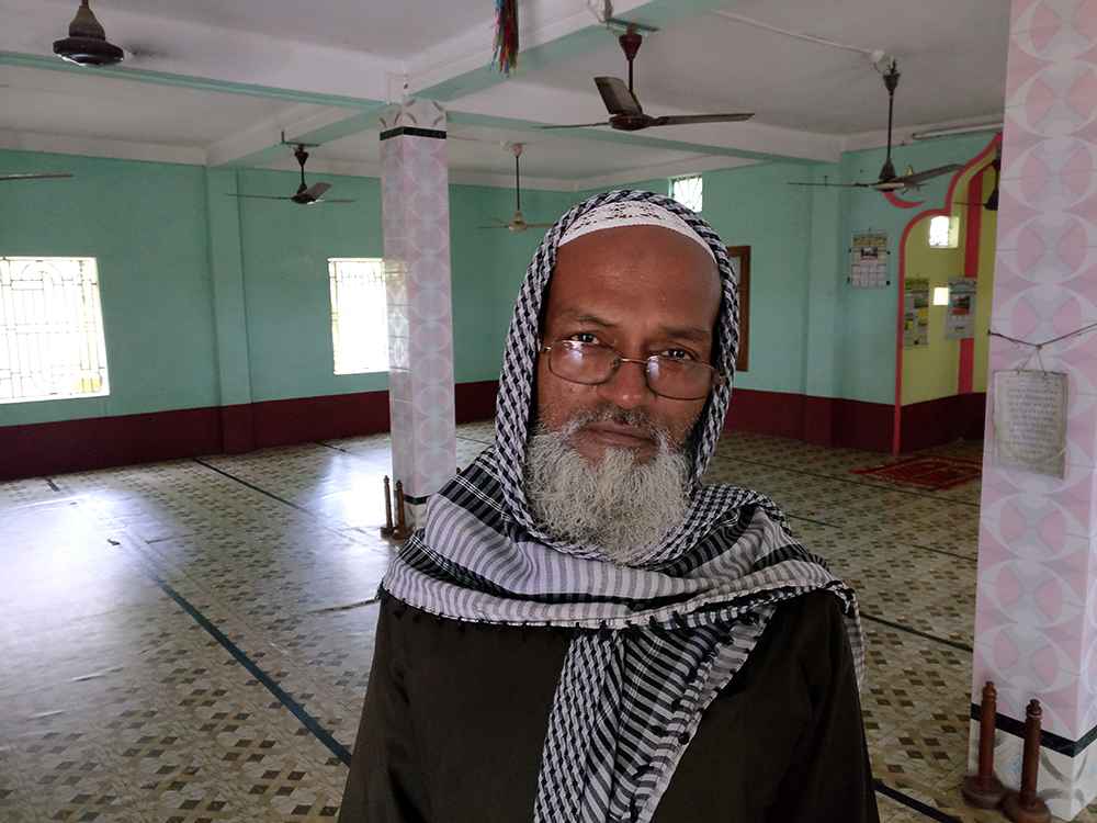 Maulana Yasin Mondal, the imam of the mosque in Magurkhali chides Muslim for reacting violently to the cartoon. Photo credit: Shoaib Daniyal Maulana Yasin Mondal, the imam of the mosque in Magurkhali chides Muslim for reacting violently to the cartoon. Photo credit: Shoaib Daniyal